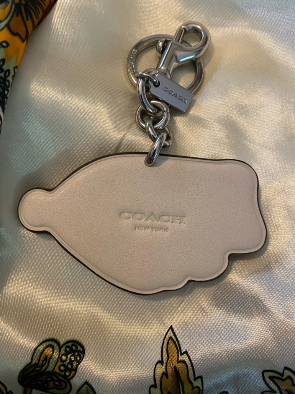 Coach Cream Leather cosmic Keychain with Silver Hardware - Picture 2 of 2